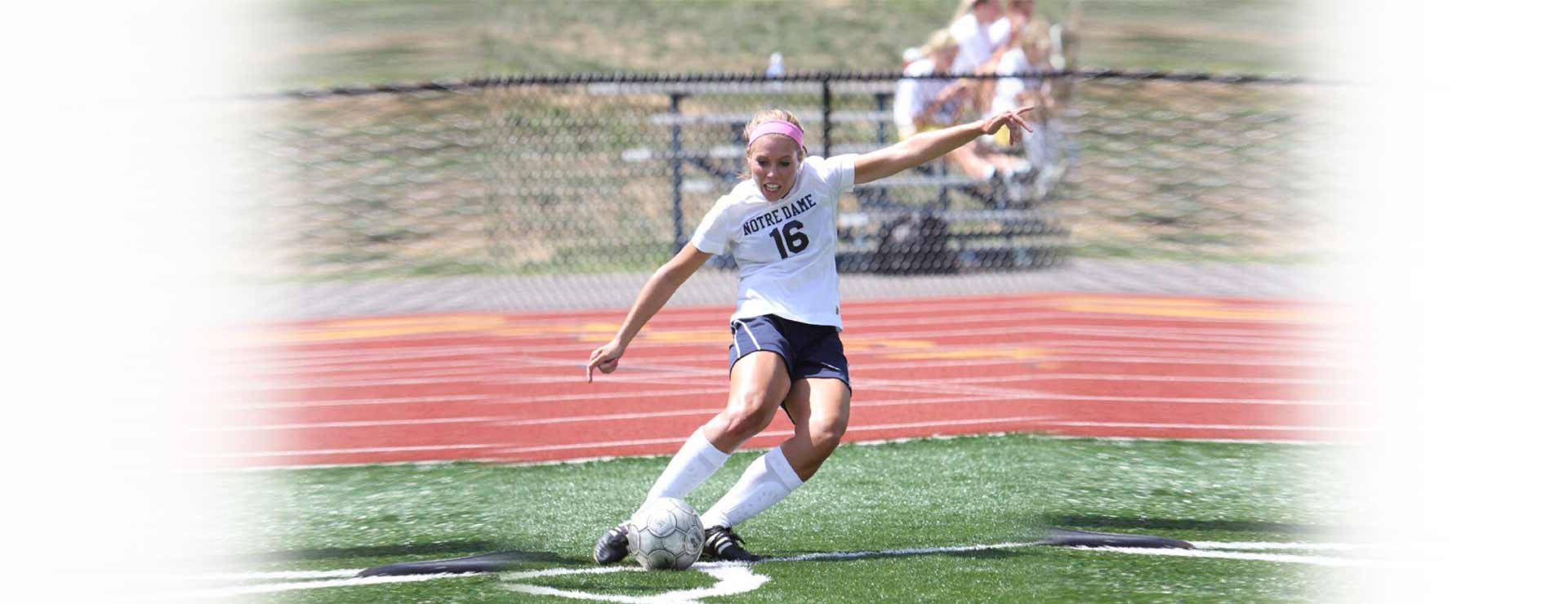 A student soccer player making a pass at Notre Dame Academy catholic all-girls school in Covington, Northern Kentuckya.
