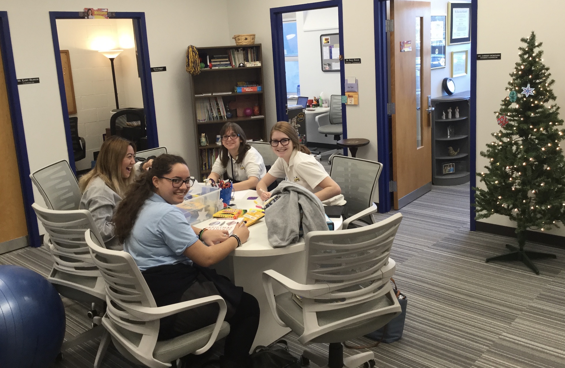 Students sitting at a table working together at Notre Dame Academy catholic all-girls school in Covington, Northern Kentucky.