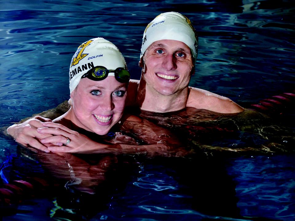 Emily Brunemann Klueh, alumnae from the Notre Dame Academy catholic all-girls school in Covington, Northern Kentucky, with her husband in the lap swimming pool.