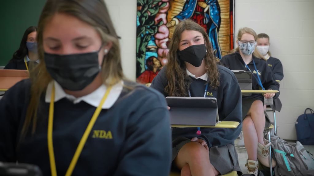 A view of a row of students sitting in a classroom at the Notre Dame Academy catholic all-girls school in Covington, Northern Kentucky.