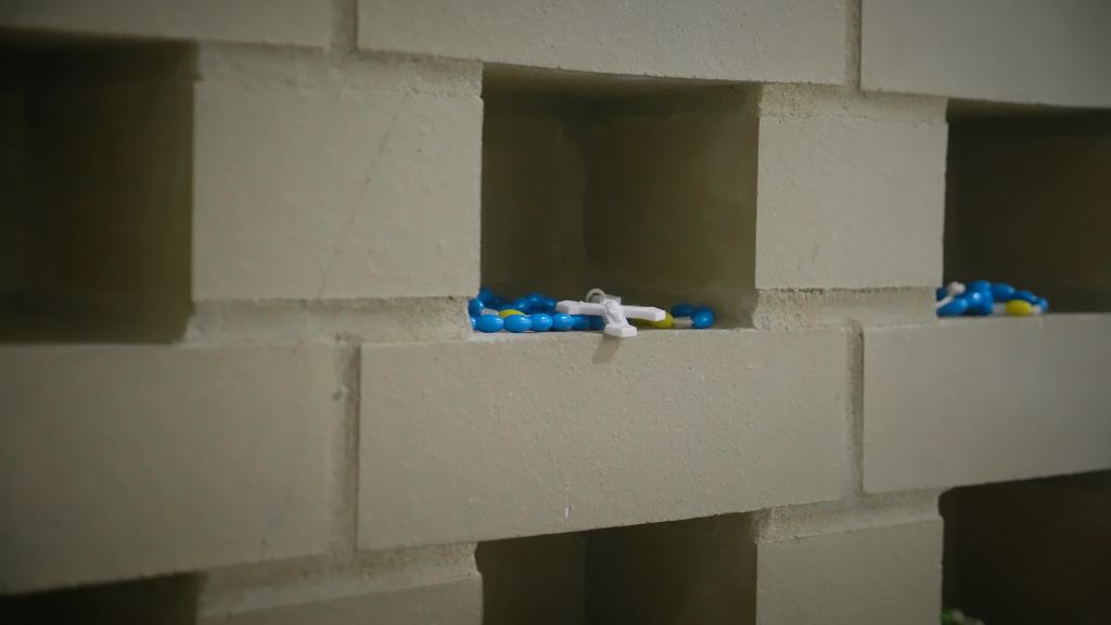 A rosary sitting in an inset of a wall at the Notre Dame Academy catholic all-girls school in Covington, Northern Kentucky.