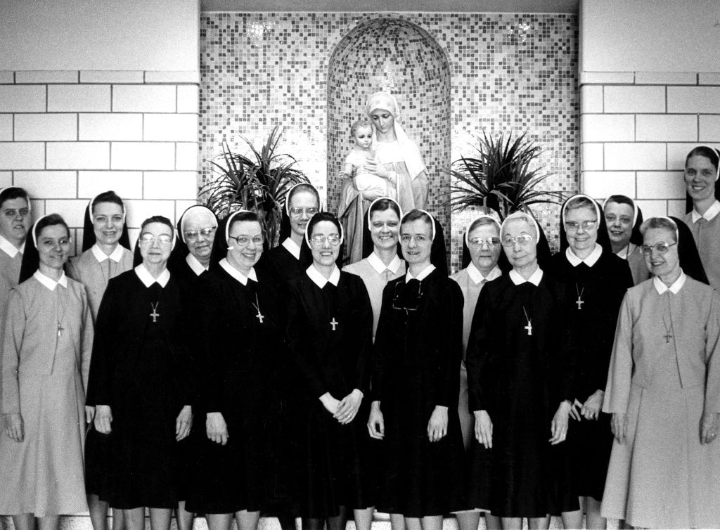 A vintage, black and white shot of the Sisters of Notre Dame at the Notre Dame Academy catholic all-girls school in Covington, Northern Kentucky.