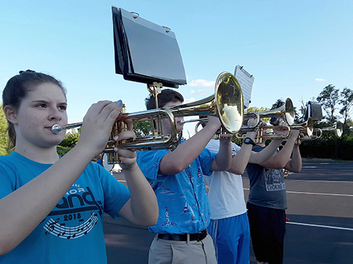 Students from Notre Dame Academy catholic all-girls school in Covington, Northern Kentucky practicing at a band rehearsal in the parking lot.